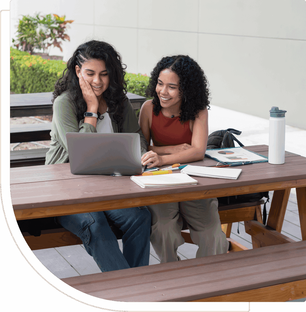 Friends studying together outdoors