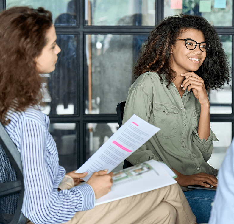 Group meeting with documents in hand